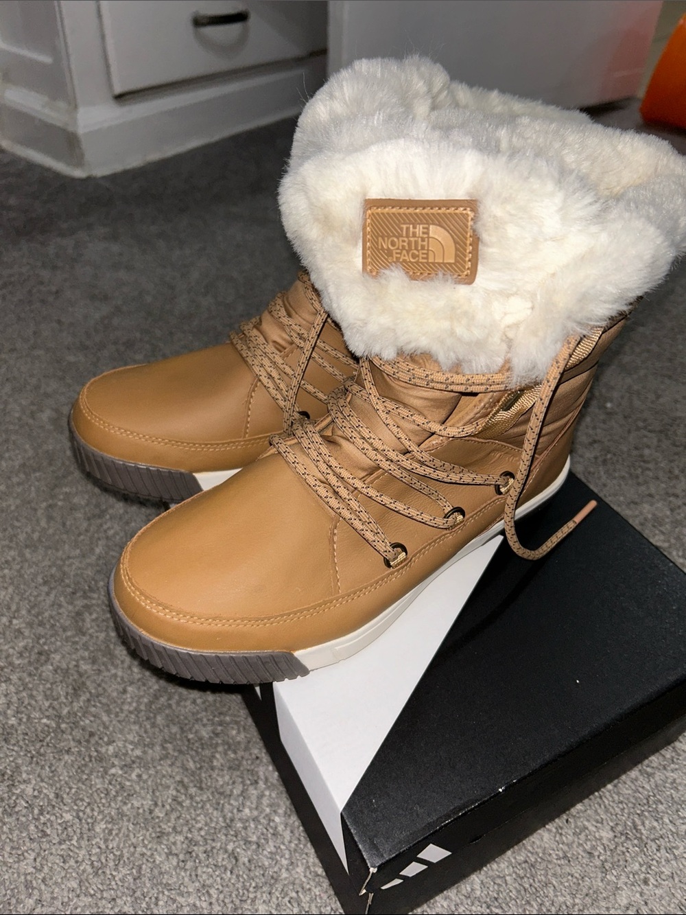 The North Face Tan Boots with White Faux Fur Collar